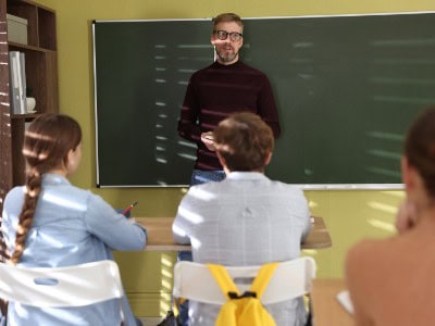 Teacher in the class with neurodivergent learners